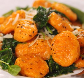 Pumpkin gnocchi with spinach and parmesan cheese